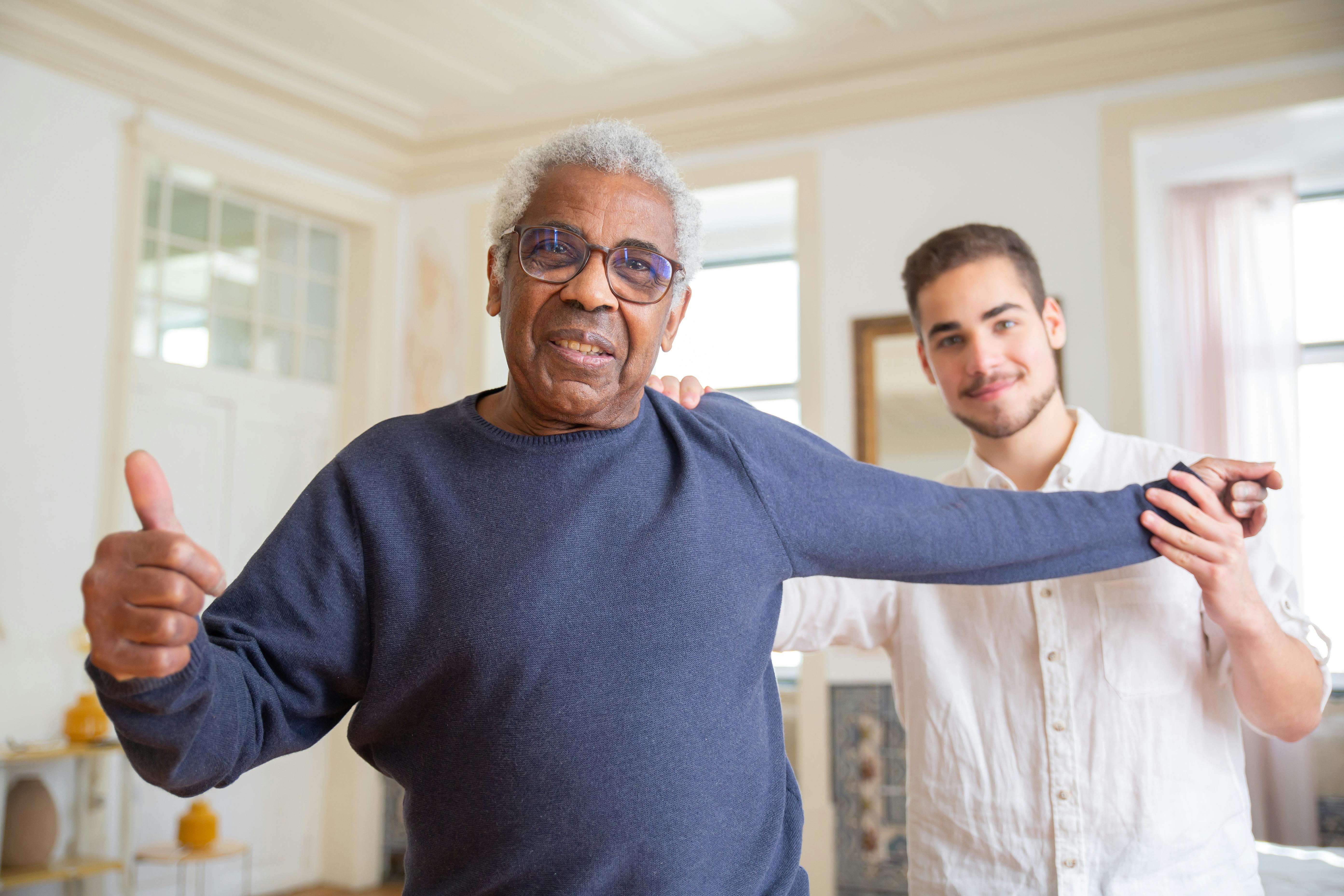 Older adult receiving supportive home care assistance